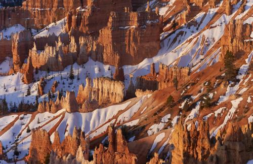 Bryce Canyon National Park Utah covered in snow at sunset.